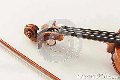 Beautiful Violin Headstock with Brown Tuning Pegs and Black Fingerboard Stock Photo