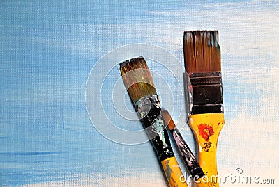 Art palette and paintbrushes Stock Photo