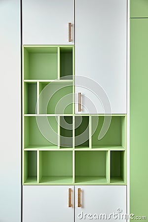 Beautiful wardrobe in green and white colors Stock Photo