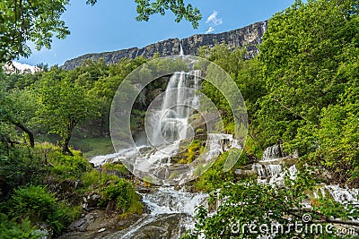 Beautiful waterfall flushing down a mountainside in Norway Stock Photo