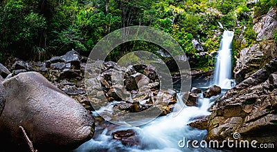 Beautiful waterfalls in the green nature, Wainui Falls, Abel Tasman, New Zealand Stock Photo