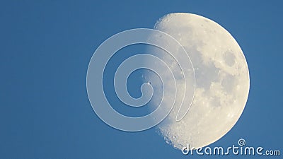 Beautiful waxing gibbous moon against a blue night sky Stock Photo