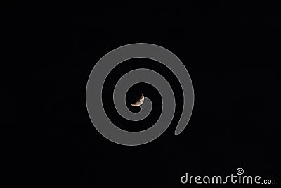 Beautiful waxing moon in the sky during night - half curved moon - crescent moon Stock Photo