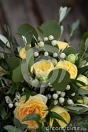 Beautiful wedding bouquet. Green and yellow bouquet. Stock Photo