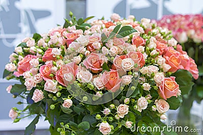 Beautiful wedding bouquet in hands of the bride. beautiful bouquet of roses Stock Photo