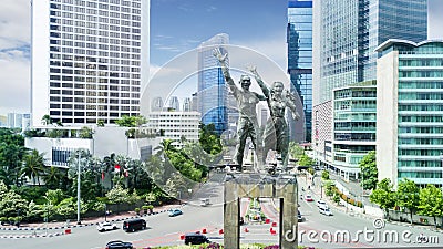 Beautiful Welcome Statue with office building Editorial Stock Photo