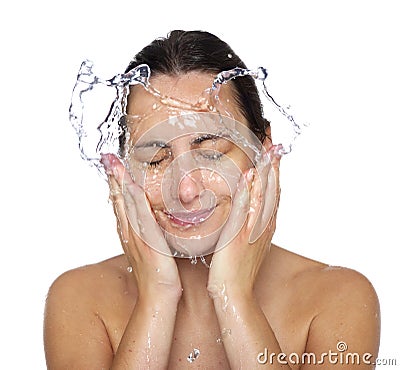 Beautiful wet woman face with water drop Stock Photo