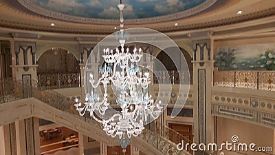 Beautiful white crystal chandelier in the Ritz Carltone Hotel Editorial Stock Photo