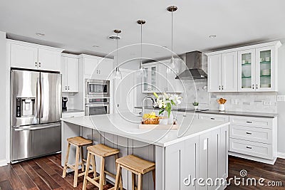 A beautiful white kitchen with the lights off. Editorial Stock Photo