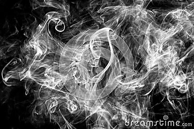 Beautiful white smoke over black background. Abstract smoke or fog texture background pattern. Stock Photo