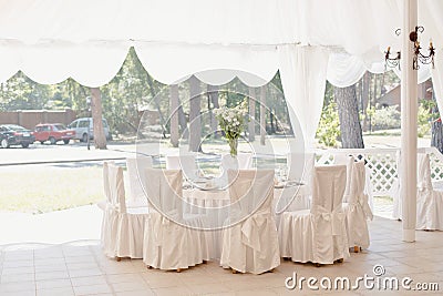 Beautiful white table and chairs in restaurant Stock Photo