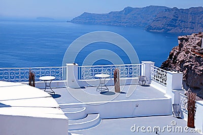 Beautiful white terrace overlooking sea in Oia, Santorini, Cycla Stock Photo