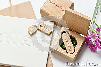 Beautiful white wedding photobook and Usb flash drive in Handmade wooden box. wedding concept Stock Photo