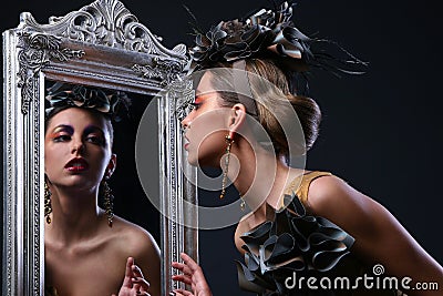Beautiful white woman in diva image Stock Photo