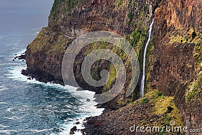 Beautiful wild coast scenery view with Bridal Veil Falls Veu da noiva at Ponta do Poiso in Madeira Island. Near Porto Moniz, Stock Photo