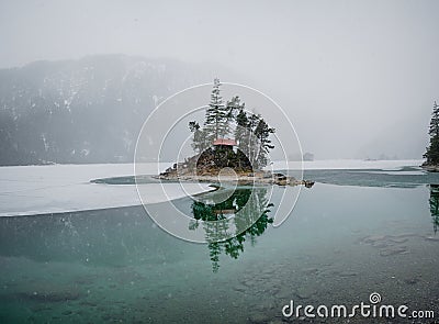 Beautiful winter day at the Eibsee near grainau at the mountain zugspitze, Stock Photo