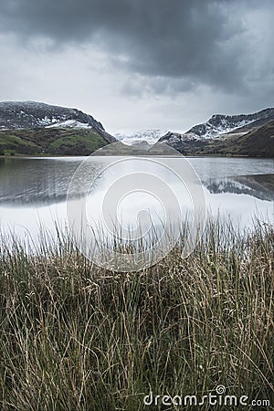 Beautiful Winter landscape image of Llyn Nantlle in Snowdonia Na Stock Photo