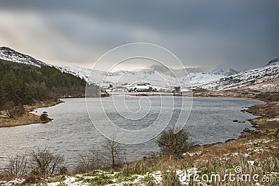 Beautiful Winter landscape image of Llynnau Mymbyr in Snowdonia Stock Photo