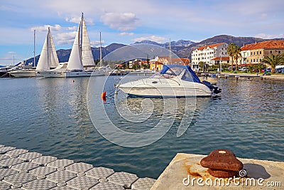 Beautiful winter Mediterranean landscape. Sailboats and fishing boats on water. Montenegro, Kotor Bay Editorial Stock Photo