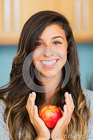 Beautiful woman with an apple Stock Photo