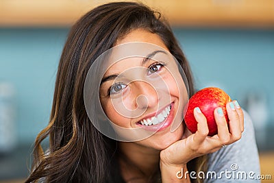 Beautiful woman with an apple Stock Photo