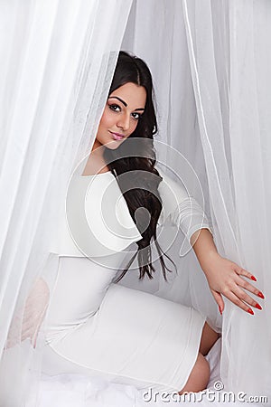 Beautiful woman in the bed Stock Photo