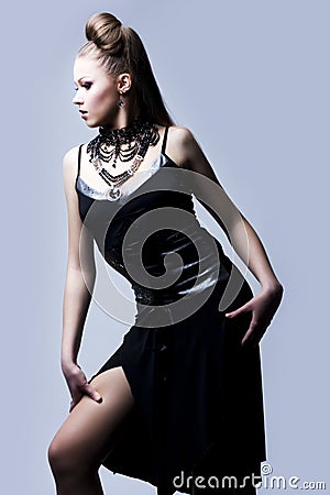 Beautiful woman in black evening gown Stock Photo