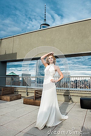 Beautiful woman bride in long white wedding dress Stock Photo