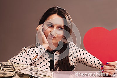 beautiful woman choosing between career and family, between money and love Stock Photo