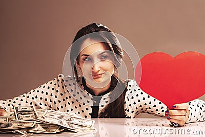 beautiful woman choosing between career and family, between money and love Stock Photo