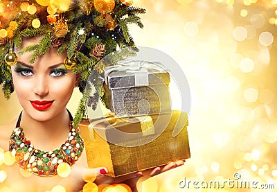 Beautiful woman with Christmas gifts Stock Photo