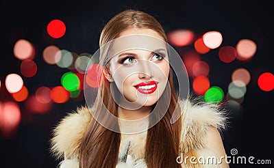 Beautiful woman on colorful nightly background Stock Photo