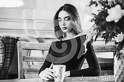 Beautiful Woman With Cup of Tea or Coffee. Beautiful girl cafe Stock Photo