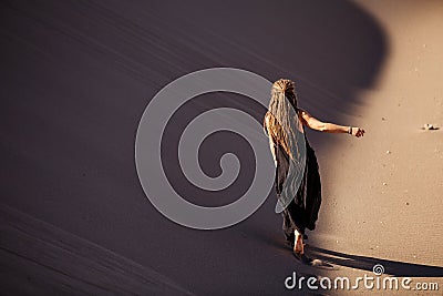 Beautiful woman in desert Stock Photo