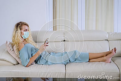 Beautiful woman doing self quarantine at home Stock Photo