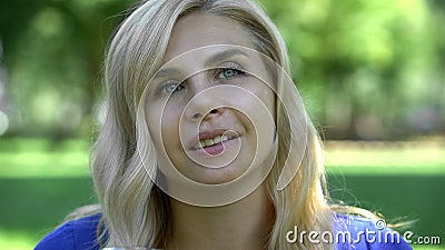 Beautiful woman dreaming in park, perfect skin close up, cosmetologist procedure Stock Photo