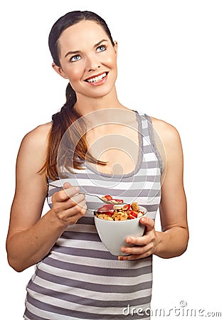 Beautiful woman eating a bowl of cereal Stock Photo