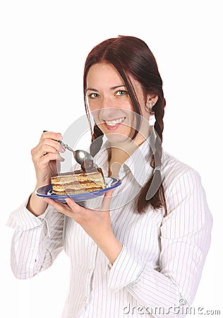 Beautiful woman eating piece of cake Stock Photo