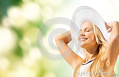 Beautiful woman enjoying summer outdoors Stock Photo