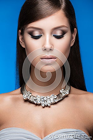 Beautiful woman with evening make-up and long Stock Photo