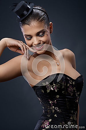 Beautiful woman in extravagant party dress Stock Photo