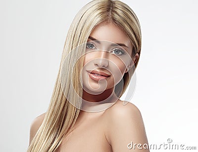 Beautiful woman face blonde hair portrait close up studio on white long hair Stock Photo