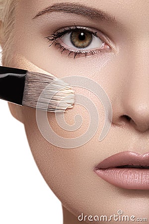 Beautiful woman face with skin foundation Stock Photo