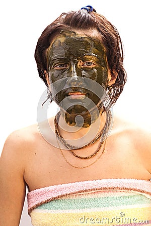 Beautiful woman with facial mask Stock Photo