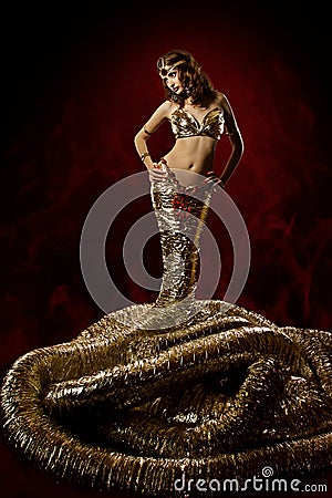 Beautiful Woman In Fantasy Dress. Snake Stylish Royalty Free Stock