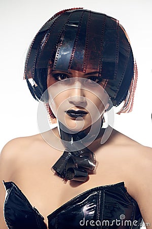 Beautiful woman with filmstrips hairstyle Stock Photo