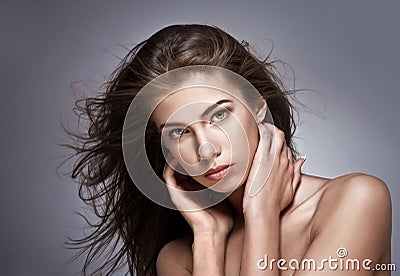 Beautiful woman with fluttering hair Stock Photo
