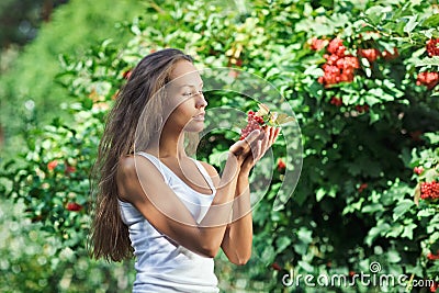 Beautiful woman with guelder rose Stock Photo