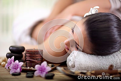 Beautiful woman having a wellness back massage Stock Photo