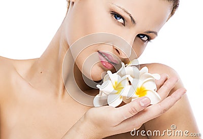 Beautiful woman holding flowers Stock Photo